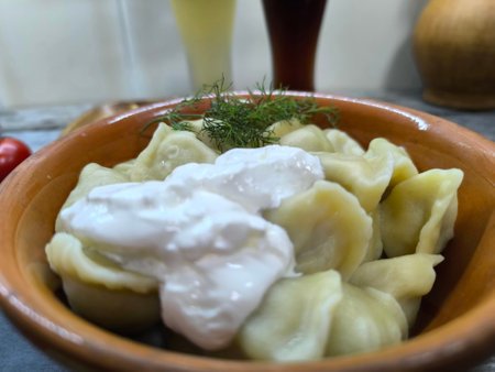 Delicious dumplings on a rustic plateの写真素材