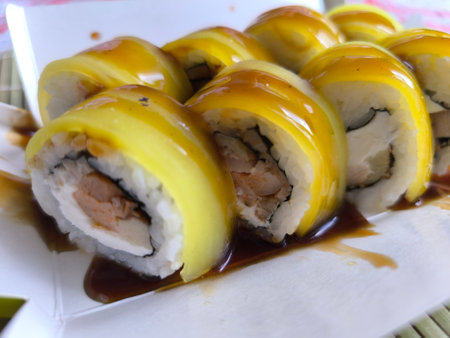 selection of fresh sushi on a white plate.High quality photoの写真素材