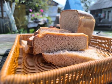 Slices of fresh sliced bread are spread on the table
