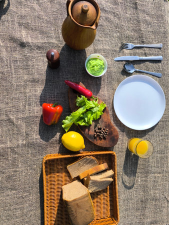 white plate on the table surrounded by vegetables and fruits high quality photoの写真素材