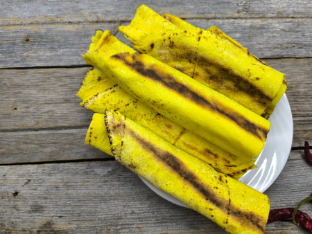 delicious cheese shawarma lies on a white plateの写真素材