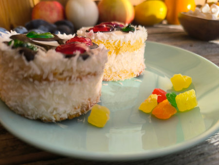 beautiful cake with a cherry pattern on a plate.の写真素材