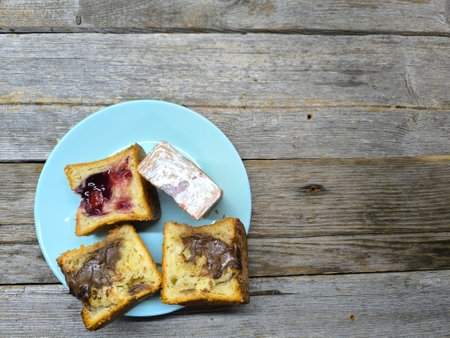 delicious pieces of sponge cake on a plateの写真素材