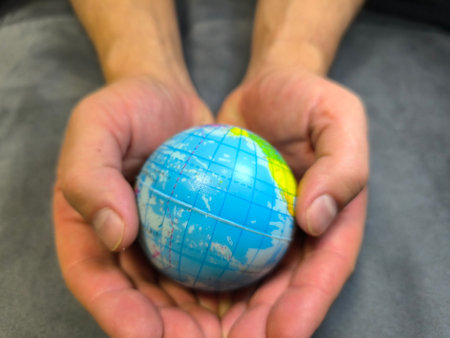 globe held by human hands. Ecology and the concept of globalization