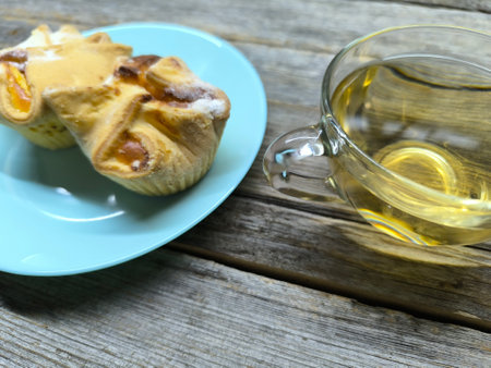 juicy fresh curd buns lie on a plateの写真素材