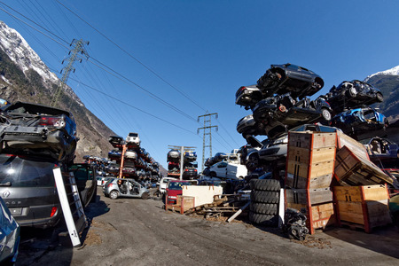 Valais, Switzerland, 21.02.2019, Recycling of old,used, wrecked cars. Dismantling for parts at scrap yards and sending for remeltingのeditorial素材