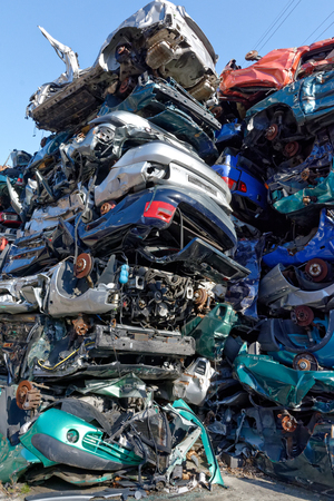 Valais, Switzerland, 21.02.2019, Recycling of old,used, wrecked cars. Dismantling for parts at scrap yards and sending for remeltingのeditorial素材
