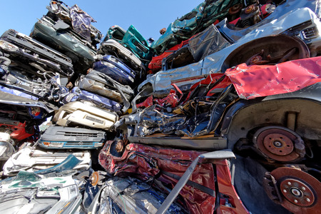 Valais, Switzerland, 21.02.2019, Recycling of old,used, wrecked cars. Dismantling for parts at scrap yards and sending for remeltingのeditorial素材