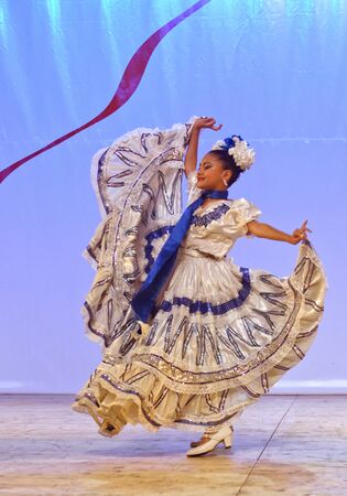 Martigny, Switzerland, 08.31.2018, Young woman, Nicaraguan folk dance performing at the gala show during the International Folk Festival of Octodides (FIFO)のeditorial素材