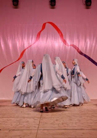 Martigny, Switzerland, 08.31.2018, Dancing group, Tatarstan folk dance performing at the gala show during the International Folk Festival of Octodides (FIFO)のeditorial素材