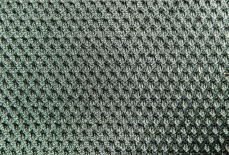The photo of texture of black fabric with deep roughness close upの写真素材