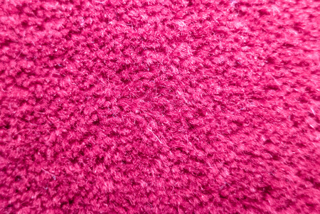 Structure of a pink bright fluffy carpet with the hairs which are sticking out extensivelyの写真素材