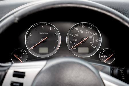 The bright photo of the dashboard in the car with black salonの写真素材