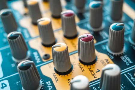 Photo of the analog mixer of the sound producer close upの写真素材
