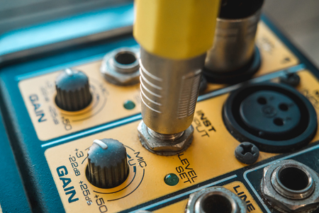 Photo of the analog mixer of the sound producer close upの写真素材
