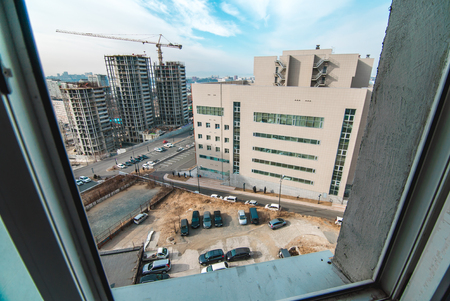 The photo of two buildings under construction standing on distanceの写真素材
