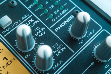 Photo of the analog audio mixer of the sound producer close upの写真素材