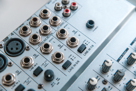 Photo of the analog mixer of the sound producer close upの写真素材