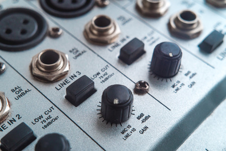 Photo of the analog mixer of the sound producer close upの写真素材
