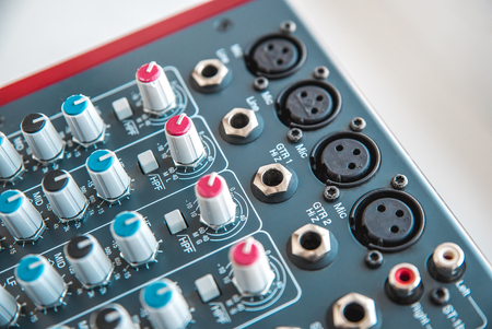 Photo of the analog mixer of the sound producer close upの写真素材