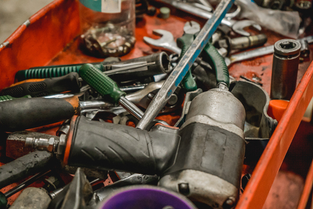 The photo of the tool for car repairs in a workshop