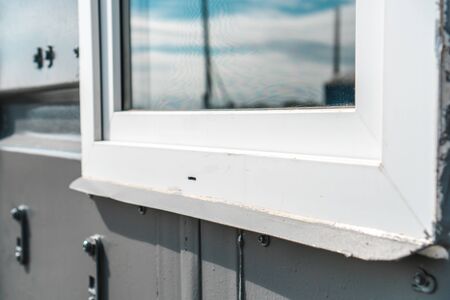 The photo of the established new white window sill indoorsの写真素材