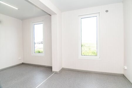 The photo of light white empty office room with bright lightingの写真素材
