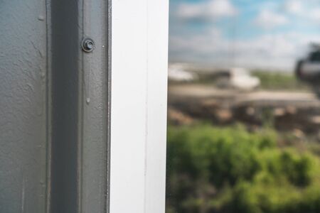 The photo of the established new white window sill indoorsの写真素材