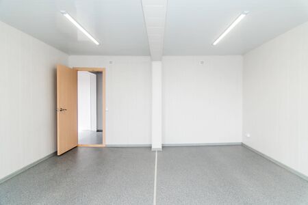 The photo of light white empty office room with bright lightingの写真素材