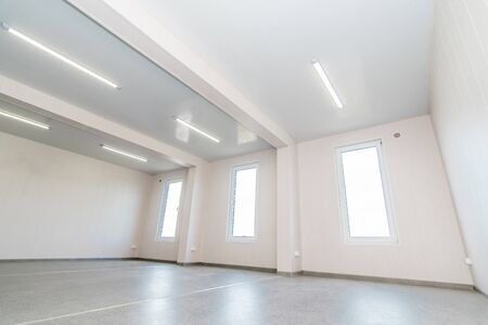 The photo of light white empty office room with bright lightingの写真素材