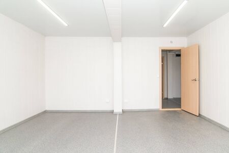 The photo of light white empty office room with bright lightingの写真素材