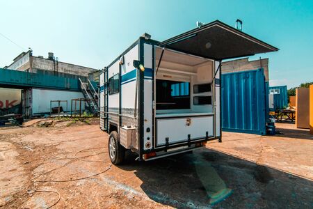 Photo of white makeshift house on wheels taken from trailerの写真素材