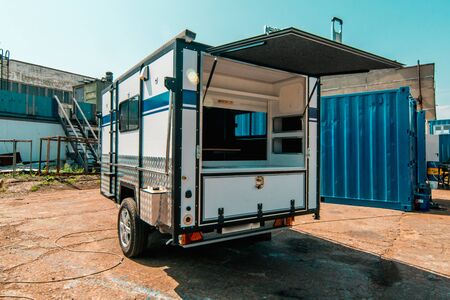 Photo of white makeshift house on wheels taken from trailerの写真素材