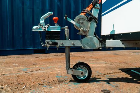 Photograph of hand winch made of steel on trailer with wheel close-upの写真素材