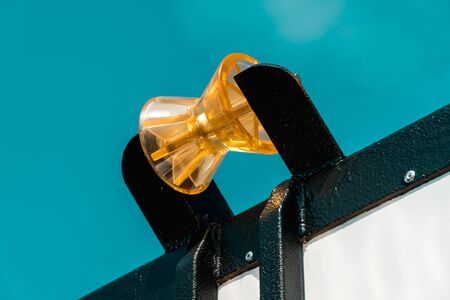 Photo of a yellow winch roller on the roof of a vanの写真素材