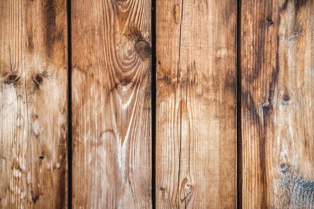 Texture of old wooden dirty boards with cracks and patternsの写真素材