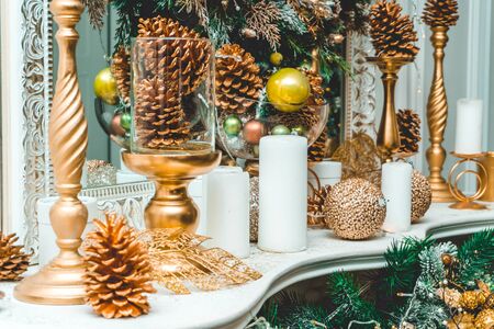 Photo of beautiful New Year toys with green tree close-upの写真素材