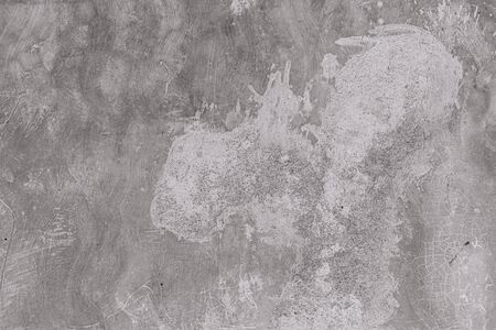 Bright photo of texture of an old white wall with lots of stainsの写真素材