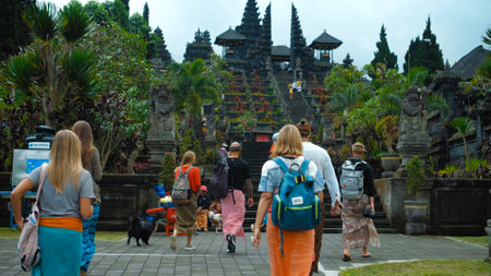 Pampatan, Rendang, Karangasem Regancy, Bali, Indonesia - July 18, 2020: Photo of people walking on the rock stears in a sacred place with ancient stone buildings on the island of baliのeditorial素材