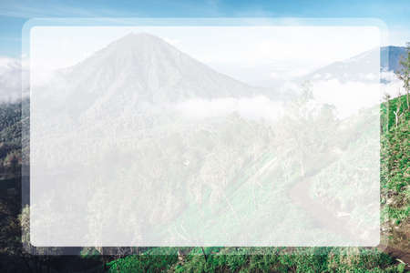 Photograph of high volcano with clouds on Java island indonesia in a transparent window