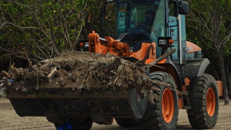 Kuta, Badung, Bali, Kuta Beach Indonesia - 4, January 2021: Tractor technic for cleaning the sea...