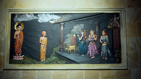 Kintamali, Bali, Indonesia - 05, July 2022: A painting on a wall in a Buddhist temple with a buddha and the history of his arrival and lifeのeditorial素材