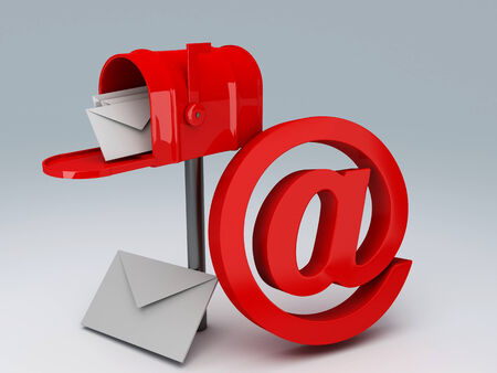 red mail box with heap of letters and AT symbolの写真素材