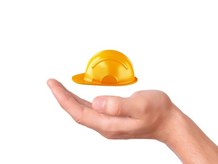 hand hold Construction Helmet on white background