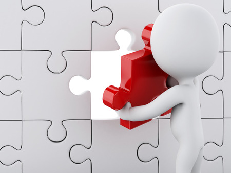 3d image renderer. White people assemble piece of a puzzle. Business concept.の写真素材