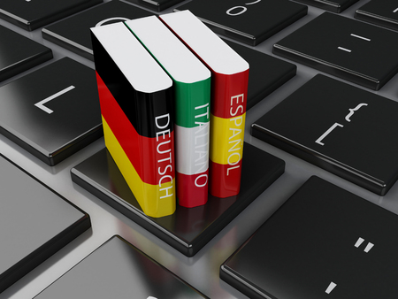 3d illustration. Dictionaries on computer keyboard. E-learning. Languages learn and translate, education concept.の写真素材