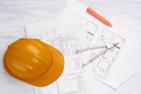 House plan with pencil, compass and helmet. Architecture concept.の写真素材