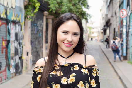 Portrait of young beautiful woman. Outdoors. Urban concept.の写真素材