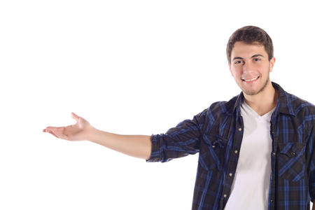 Portrait of a young man showing something on palm. Isolated white background.の写真素材