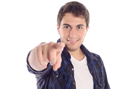 Close up of a young man pointing camera. Isolated white background.の写真素材
